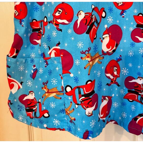 The Scrub Co XL Women’s Santa Scrub Top Blue With Adorable Santas - Picture 3 of 5